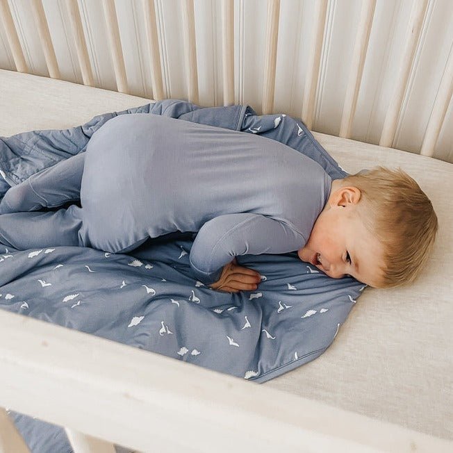 günamüna Convertible Footie Dino (Min. of 2, multiples of 2) - MAIGHAN DISTRIBUTION CANADA