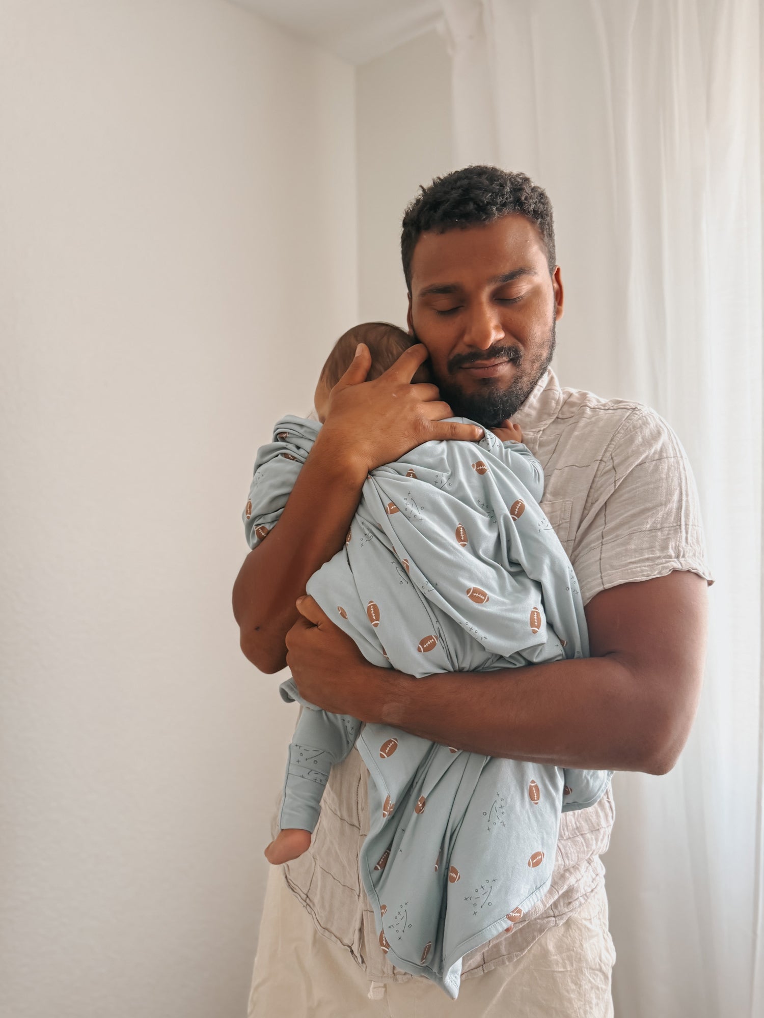 günamüna Mini Cozy Cloud Comforter Baby Blanket - Football 1 TOG (Min. of 2, multiples of 2) - MAIGHAN DISTRIBUTION CANADA