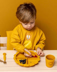 Trixie Waterproof long sleeve bib - Mr. Lion (Min. of 3 PK, multiples of 3 PK) - MAIGHAN DISTRIBUTION CANADA
