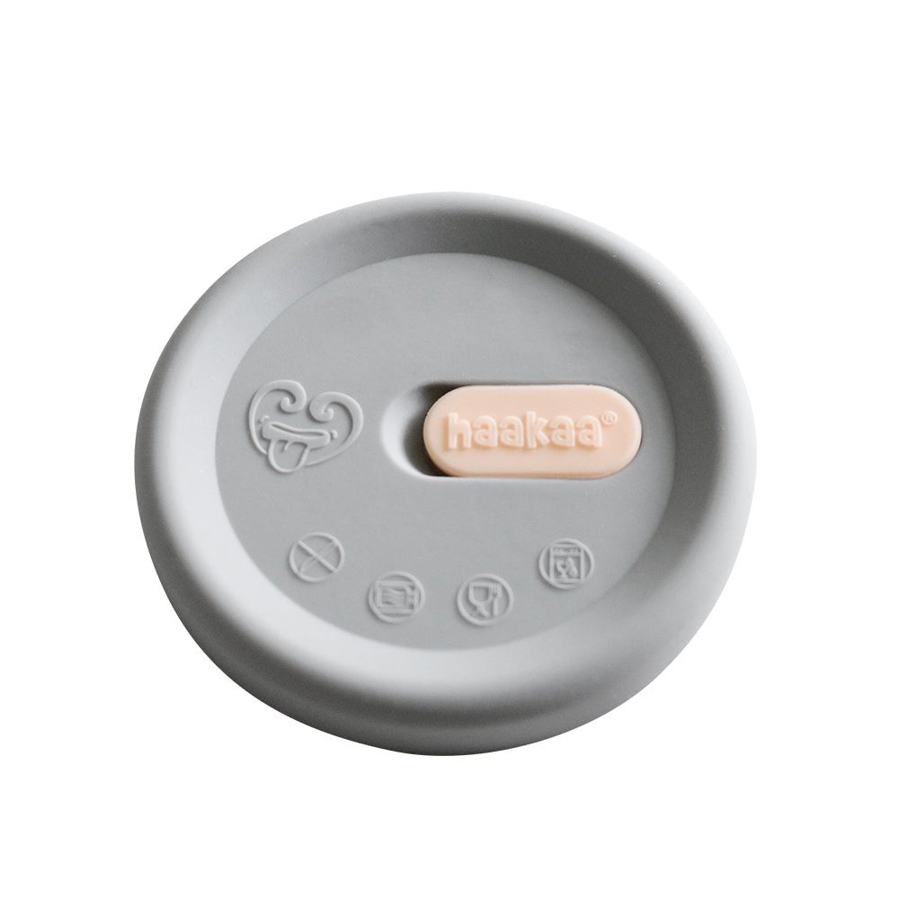 Haakaa Grey Silicone Lid English French fits all pumps) (Min. of 2 , multiples of 2) - MAIGHAN DISTRIBUTION CANADA